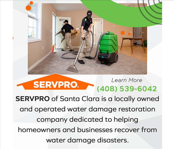 SERVPRO professional in protective gear inspecting or cleaning an area affected by water damage.